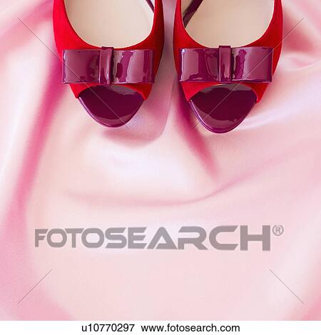 Pair of red high heel open toe shoes on pink textile View Large Photo Image Stock Photo - Pair of red high heel open toe shoes on pink textile. Fotosearch
