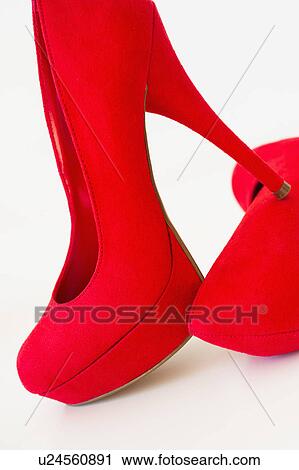 Pair of red stilettos on white background View Large Photo Image Stock Image - Pair of red stilettos on white background. Fotosearch