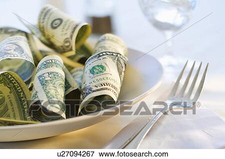 Paper currency on dinner plate, studio shot View Large Photo Image Stock Photo - Paper currency on dinner plate, studio shot. Fotosearch