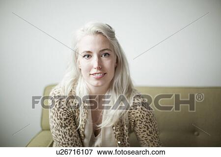 Stock Photo - Portrait of attractive young woman. Fotosearch