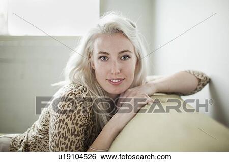 Stock Photograph - Portrait of attractive young woman. Fotosearch