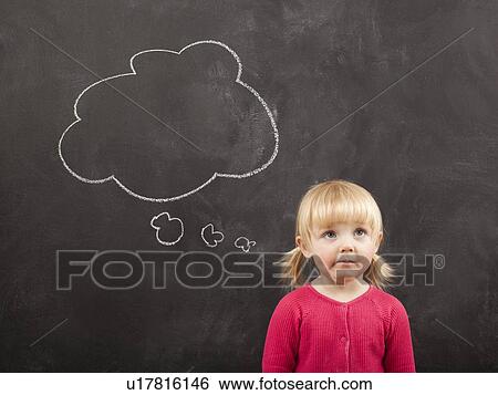 Portrait of baby girl (18-23 months) in front of blackboard View Large Photo Image Stock Photograph - Portrait of baby girl (18-23 months) in front of blackboard. Fotosearch