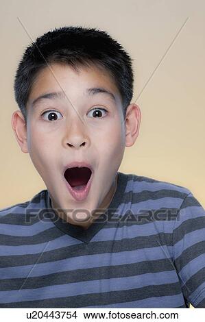 Portrait of boy with astonished expression View Large Photo Image Picture - Portrait of boy with astonished expression. Fotosearch