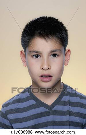 Portrait of boy with concerned expression View Large Photo Image Stock Photo - Portrait of boy with concerned expression. Fotosearch