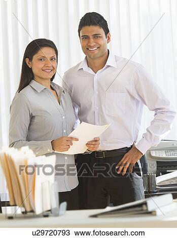 Portrait of businesswoman and businessman View Large Photo Image Stock Image - Portrait of businesswoman and businessman. Fotosearch