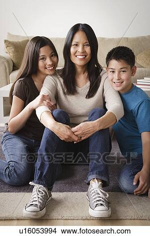 Portrait of cheerful family View Large Photo Image Picture - Portrait of cheerful family. Fotosearch