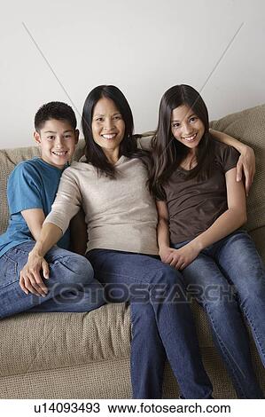 Portrait of cheerful family View Large Photo Image Stock Image - Portrait of cheerful family. Fotosearch