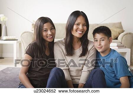 Portrait of cheerful family View Large Photo Image Stock Image - Portrait of cheerful family. Fotosearch