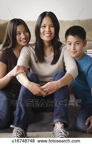 Portrait of cheerful family View Large Photo Image Stock Photo - Portrait of cheerful family. Fotosearch