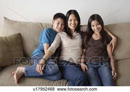 Portrait of cheerful family View Large Photo Image Stock Photo - Portrait of cheerful family. Fotosearch