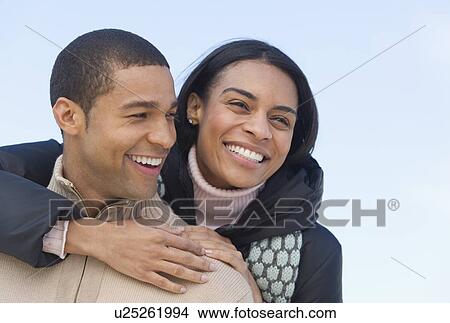 Picture - Portrait of couple embracing. Fotosearch