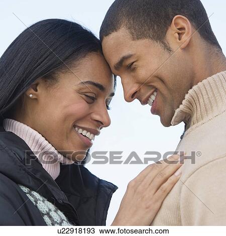 Portrait of couple embracing View Large Photo Image Stock Image - Portrait of couple embracing. Fotosearch