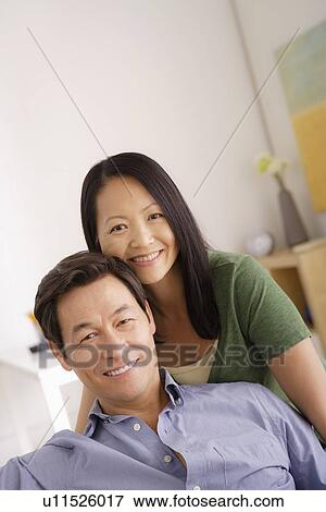 Portrait of couple smiling View Large Photo Image Stock Photo - Portrait of couple smiling. Fotosearch