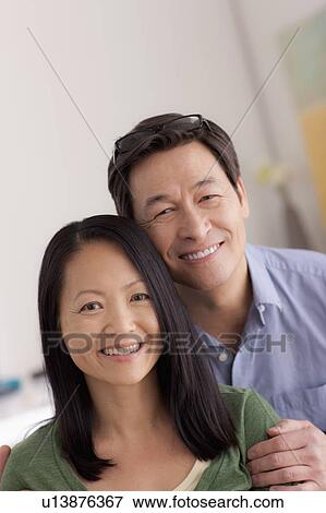 Portrait of couple smiling View Large Photo Image Stock Photo - Portrait of couple smiling. Fotosearch