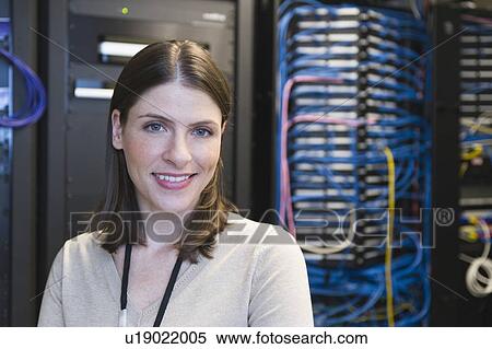 Portrait of female IT support technician View Large Photo Image Stock Photography - Portrait of female IT support technician. Fotosearch