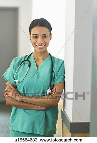 Portrait of female nurse in hospital View Large Photo Image Stock Image - Portrait of female nurse in hospital. Fotosearch