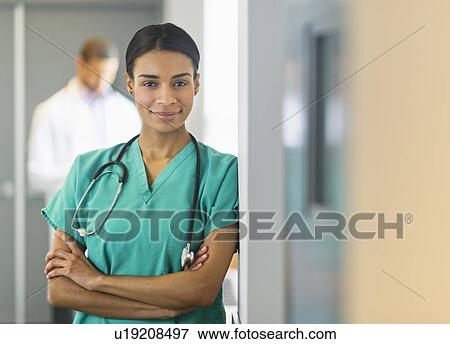 Portrait of female nurse in hospital View Large Photo Image Stock Photo - Portrait of female nurse in hospital. Fotosearch