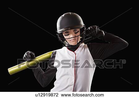 Portrait of girl (12-13) plying softball View Large Photo Image Stock Image - Portrait of girl (12-13) plying softball. Fotosearch