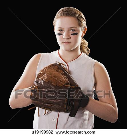 Portrait of girl (12-13) plying softball, studio shot View Large Photo Image Stock Image - Portrait of girl (12-13) plying softball, studio shot. Fotosearch
