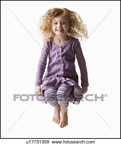 Portrait of girl (4-5), studio shot View Large Photo Image Stock Photo - Portrait of girl (4-5), studio shot. Fotosearch