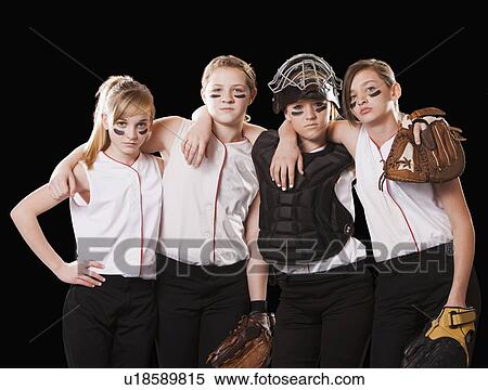 Portrait of girls (12-13) playing softball View Large Photo Image Stock Photography - Portrait of girls (12-13) playing softball. Fotosearch