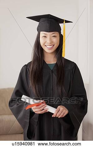 Portrait of graduated young woman View Large Photo Image Stock Image - Portrait of graduated young woman. Fotosearch