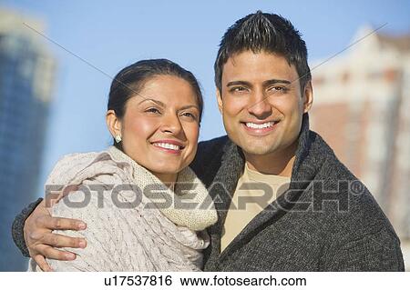 Portrait of happy couple outdoors View Large Photo Image Stock Photograph - Portrait of happy couple outdoors. Fotosearch
