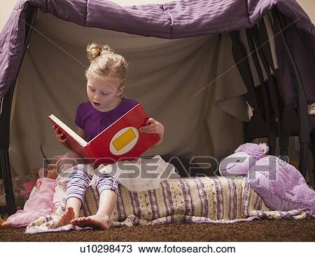 Portrait of happy girl (4-5) in playhouse View Large Photo Image Stock Image - Portrait of happy girl (4-5) in playhouse. Fotosearch