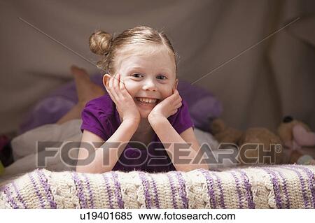 Stock Photography - Portrait of happy girl (4-5). Fotosearch