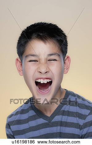 Portrait of laughing boy View Large Photo Image Stock Photograph - Portrait of laughing boy. Fotosearch