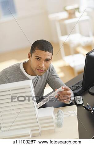 Portrait of male architect in office View Large Photo Image Stock Photo - Portrait of male architect in office. Fotosearch