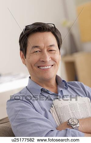 Stock Image - Portrait of man smiling. Fotosearch