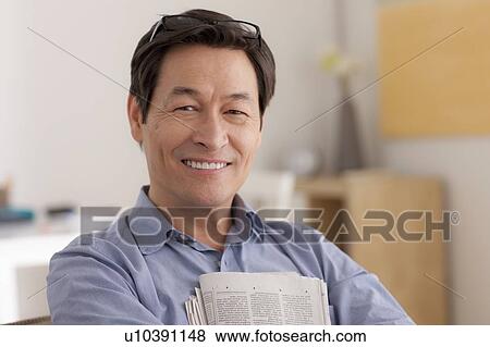 Stock Photo - Portrait of man smiling. Fotosearch