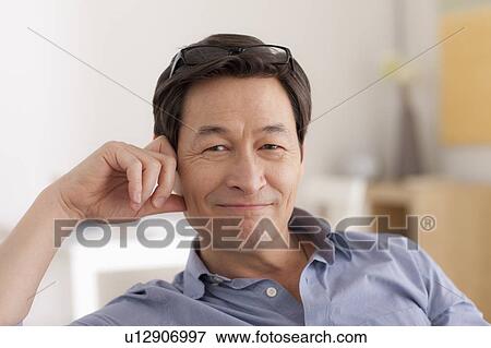 Stock Photo - Portrait of man smiling. Fotosearch