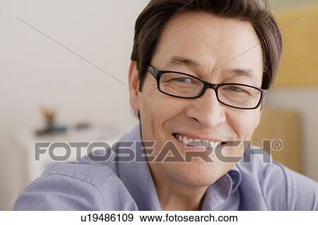 Portrait of man smiling View Large Photo Image Stock Photo - Portrait of man smiling. Fotosearch
