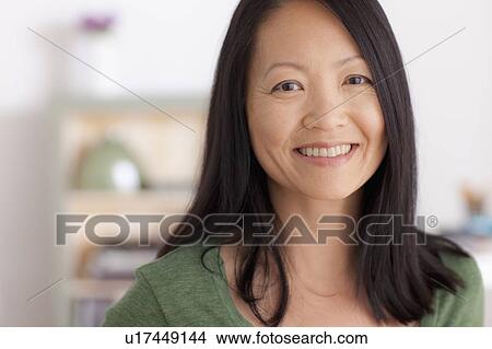 Portrait of mature woman smiling View Large Photo Image Picture - Portrait of mature woman smiling. Fotosearch