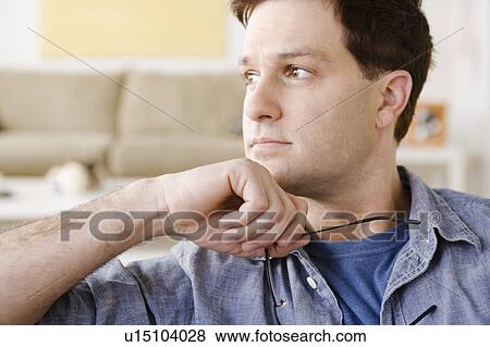 Stock Photo - Portrait of mid adult man. Fotosearch