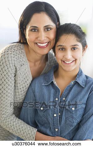 Portrait of mother and daughter (12-13) View Large Photo Image Picture - Portrait of mother and daughter (12-13). Fotosearch