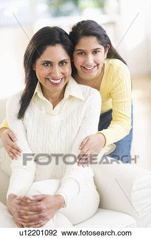 Portrait of mother and daughter (12-13) at home View Large Photo Image Stock Image - Portrait of mother and daughter (12-13) at home. Fotosearch