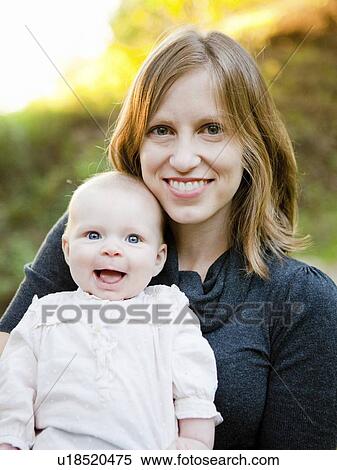 Stock Photography - Portrait of mother and daughter (18-23 months). Fotosearch