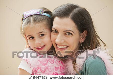 Portrait of mother with her daughter (4-5) View Large Photo Image Stock Image - Portrait of mother with her daughter (4-5). Fotosearch