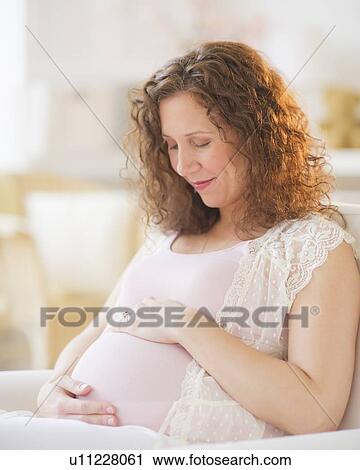 Portrait of pregnant woman View Large Photo Image Stock Image - Portrait of pregnant woman. Fotosearch