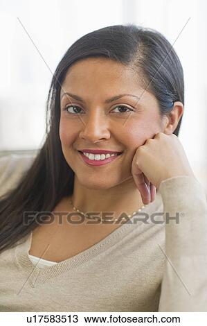 Stock Image - Portrait of relaxed woman. Fotosearch