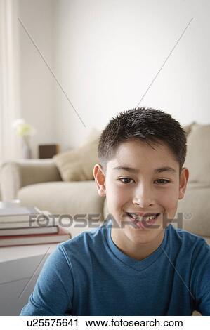 Portrait of smiling boy (10-11) View Large Photo Image Stock Image - Portrait of smiling boy (10-11). Fotosearch