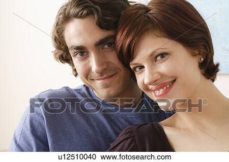 Stock Image - Portrait of smiling couple. Fotosearch