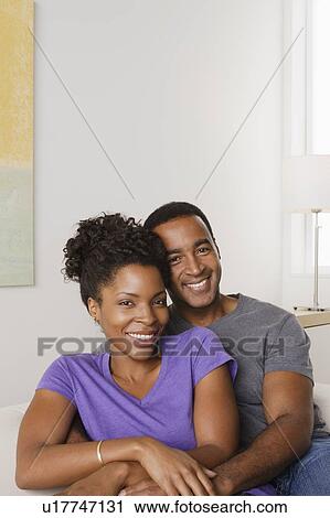 Stock Image - Portrait of smiling couple. Fotosearch