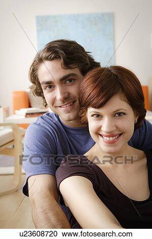 Stock Image - Portrait of smiling couple. Fotosearch