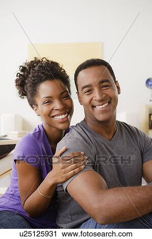 Stock Image - Portrait of smiling couple. Fotosearch
