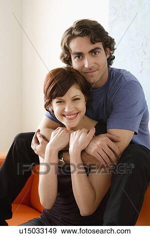 Stock Photo - Portrait of smiling couple. Fotosearch