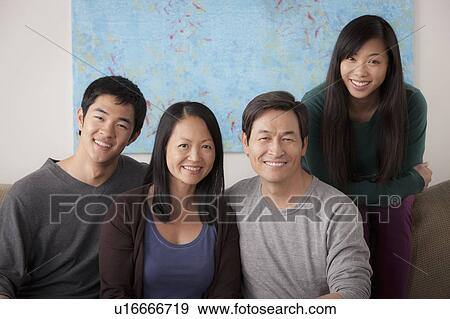 Stock Photo - Portrait of smiling family. Fotosearch